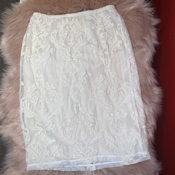 Forever 21 Dresses & Skirts - White Lace skirt in size medium